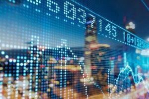 Image of financial graph over cityscape