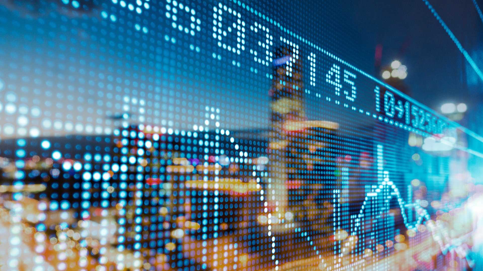 Image of financial graph over cityscape