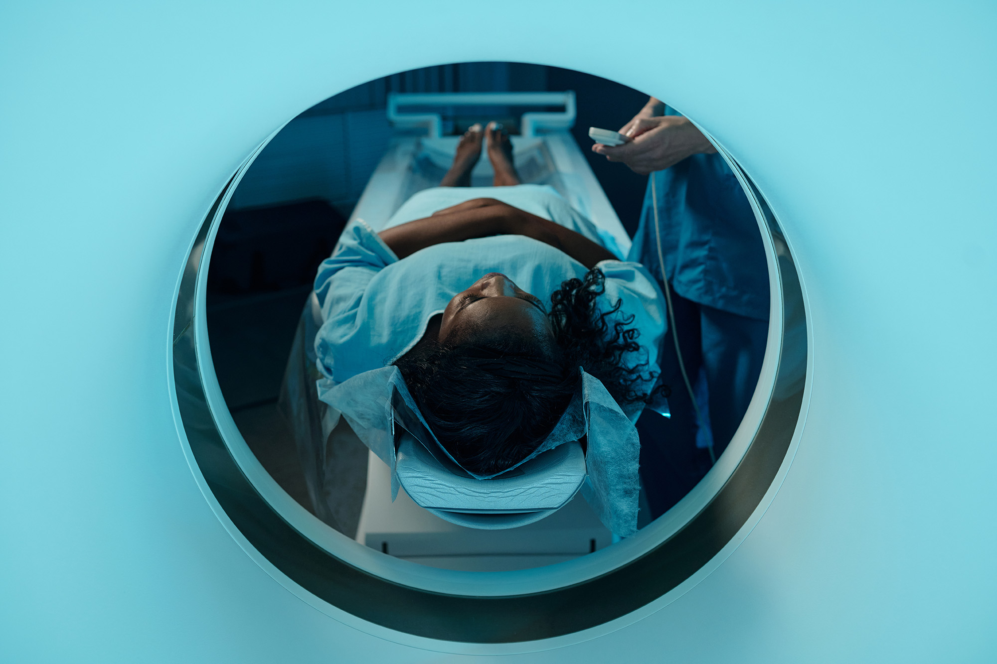 Woman undergoing a CT scan in a medical facility
