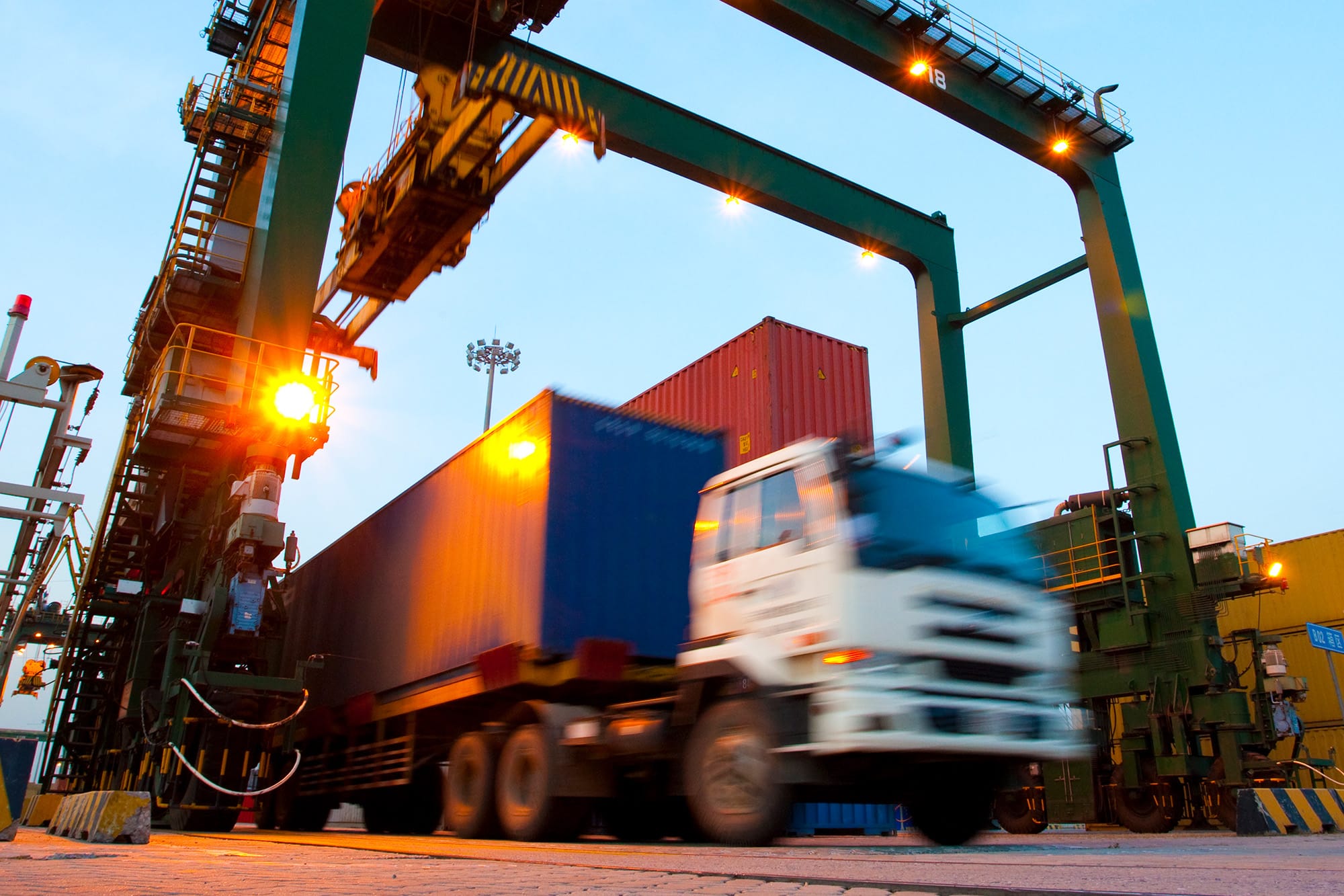 A semi-truck exiting a distribution facility