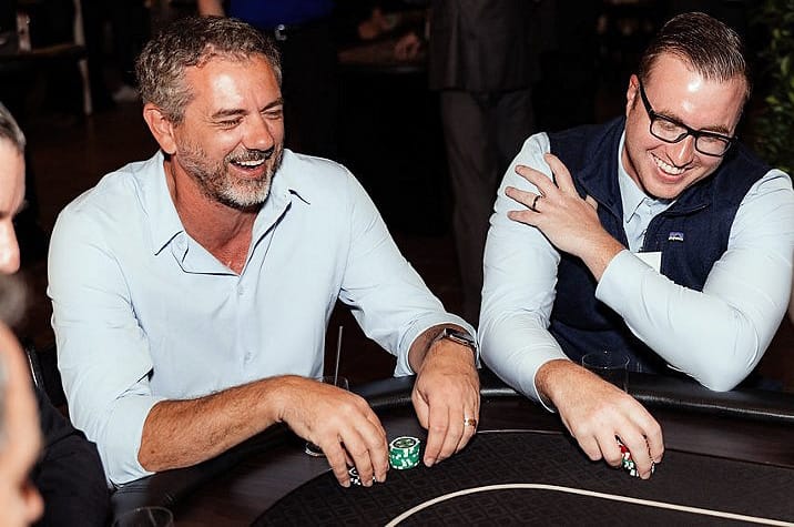 team members playing poker